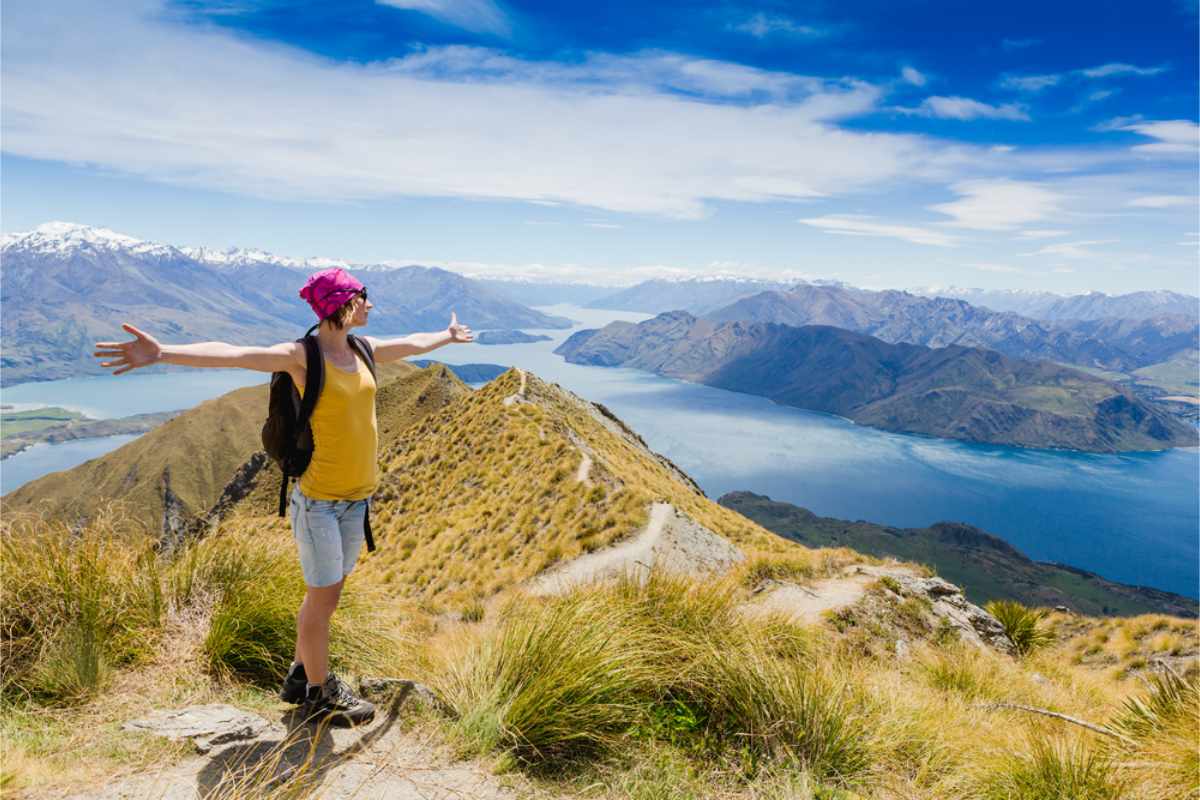 Tourist enjoying the beautiful landscape of New Zealand countryside