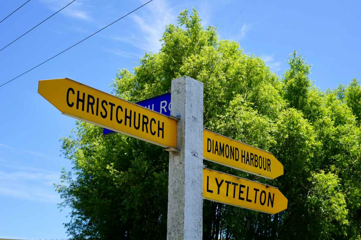 street sign post showing the way to Christchurch, NZ